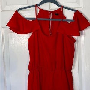 Red romper with off the shoulder short sleeves